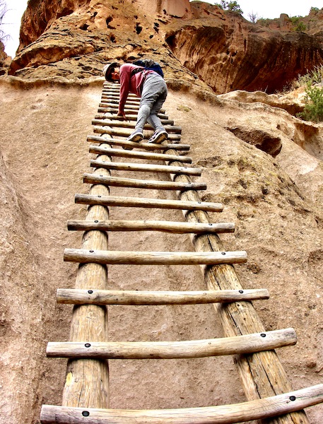 woman on high ladder