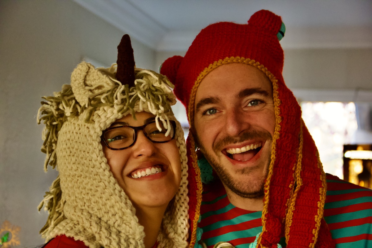 young couple with silly hats