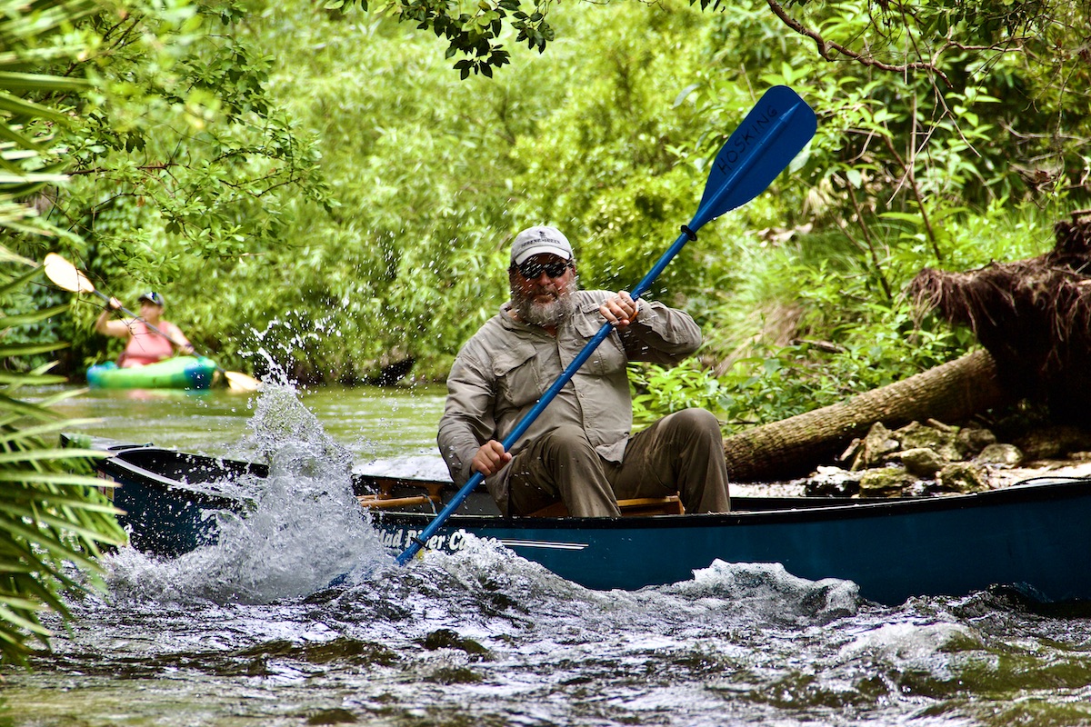 man canoeing