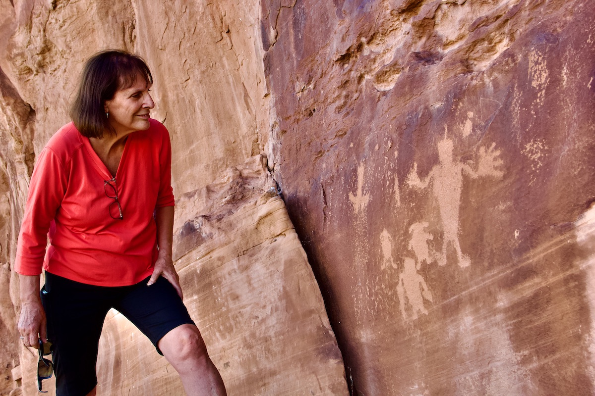 woman and petroglyphs