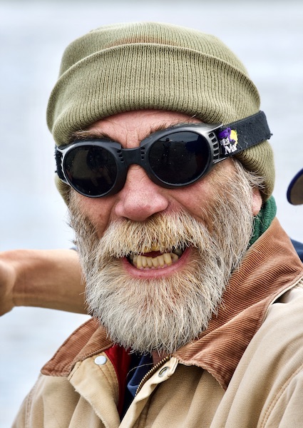 man's face, with sunglasses