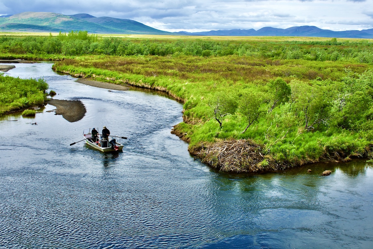 small fishing boat on stream