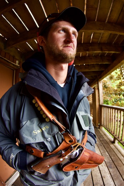 man with holstered pistol