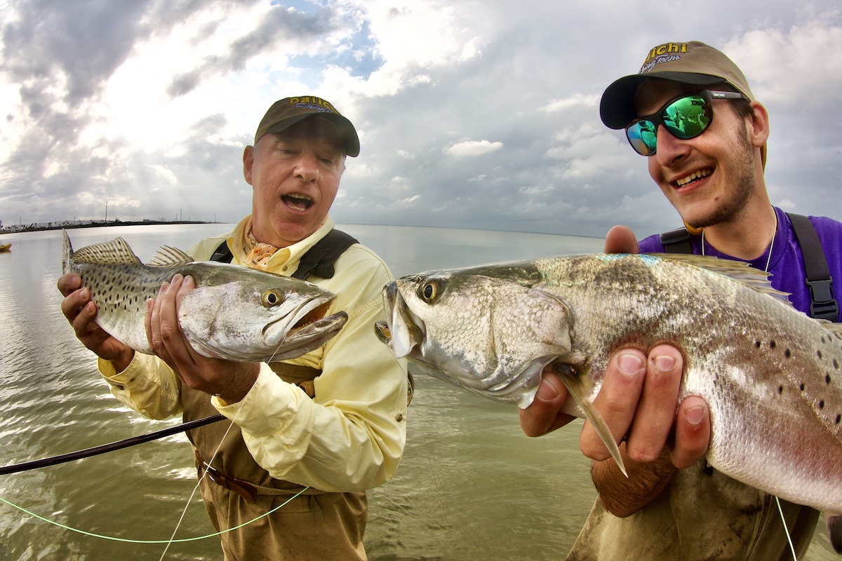 two fly fishers with seatrout