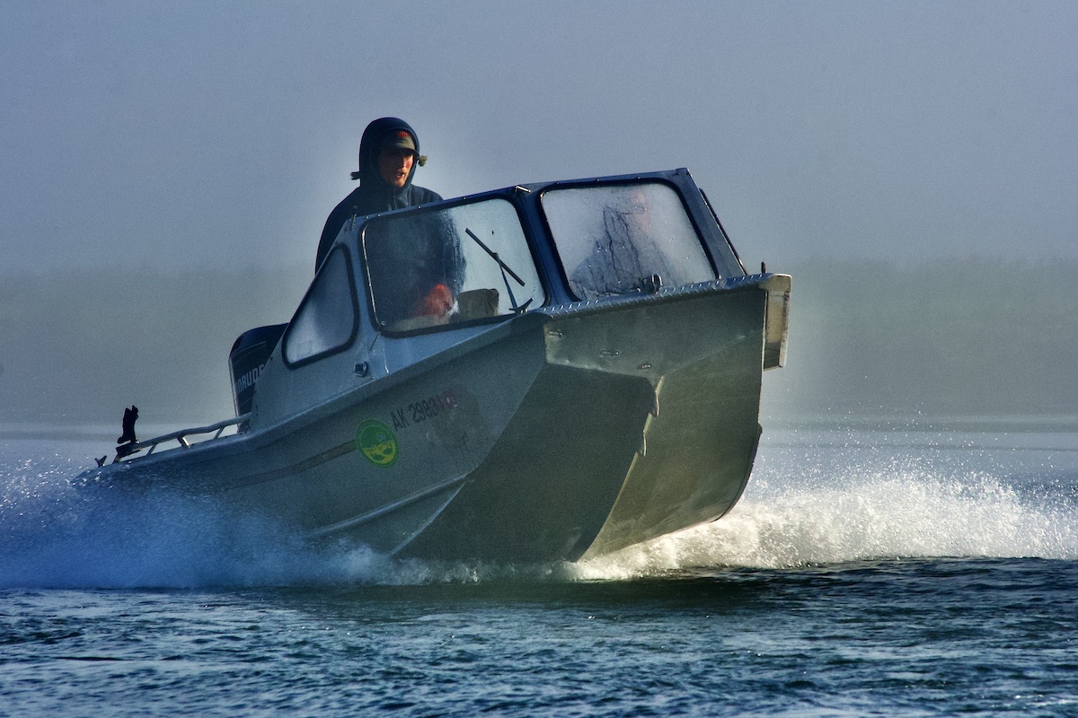 running a boat on a foggy mornin g